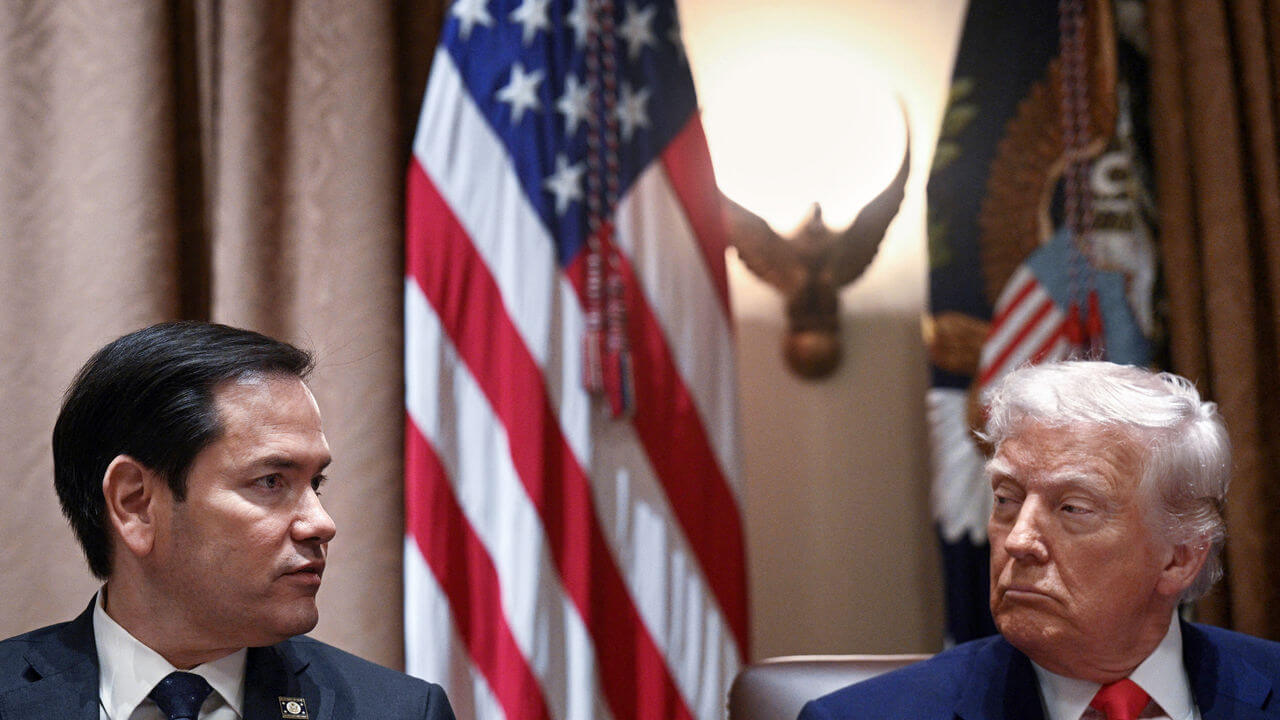 US President Donald Trump looks at Secretary of State Marco Rubio during a cabinet meeting in the Cabinet Room of the White House.