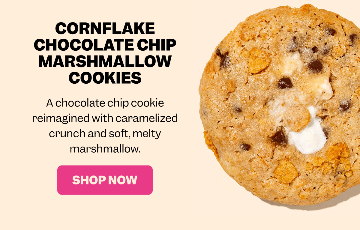 Close-up of a cookie with cornflakes, chocolate chips, and melted marshmallow on a beige background. Text reads: CORNFLAKE CHOCOLATE CHIP MARSHMALLOW COOKIES A chocolate chip cookie reimagined with caramelized crunch and soft, melty marshmallow. Pink button with white text: SHOP NOW.