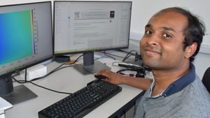 Suraj Krishnamurti works at computer