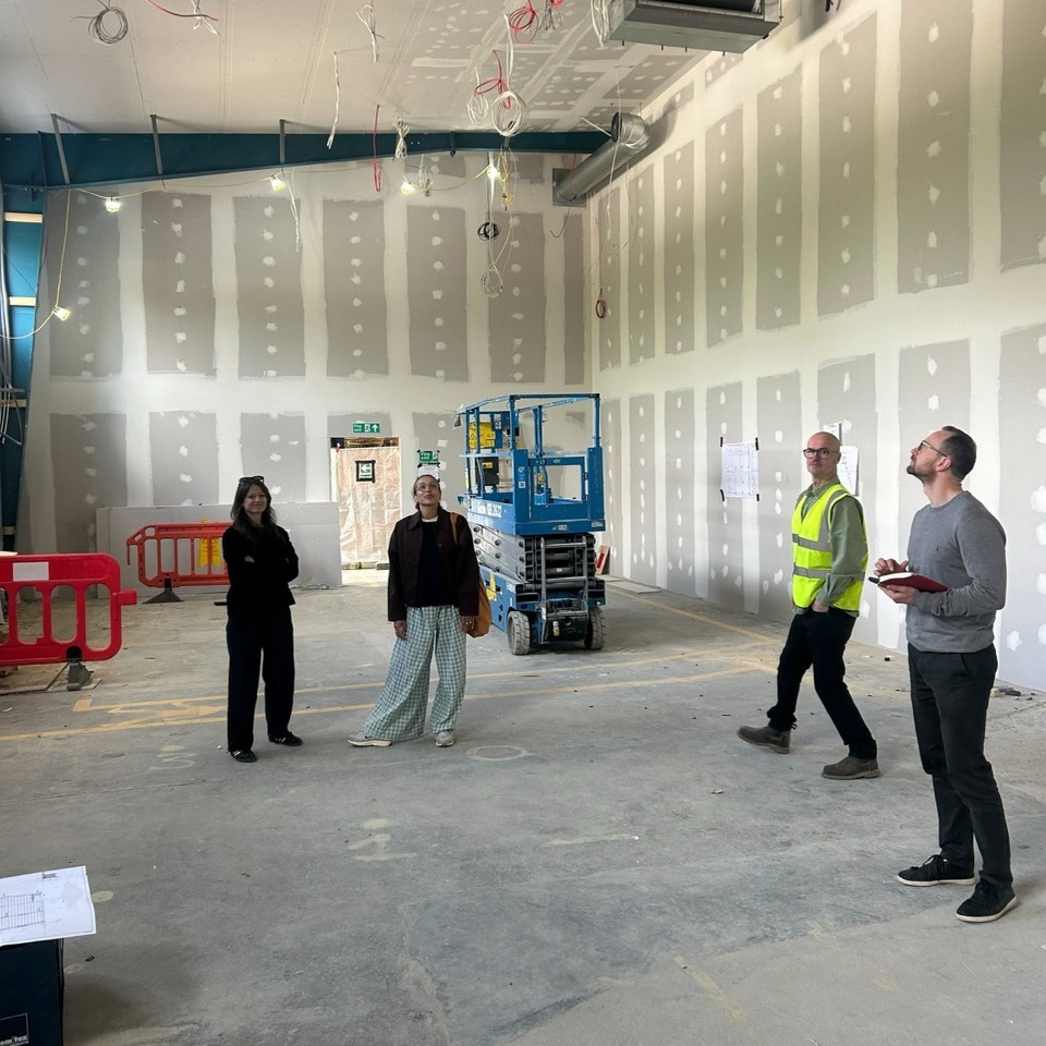 Harley and Lisa inspecting the new brewery