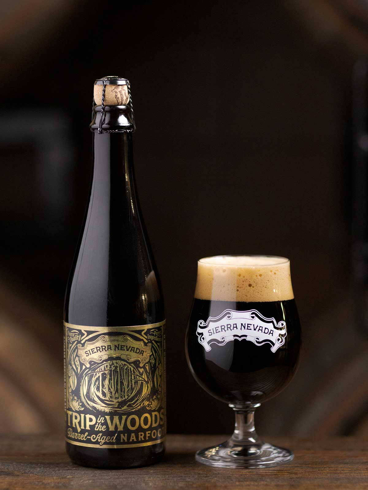 A bottle and full glass of Barrel-Aged Narfoot