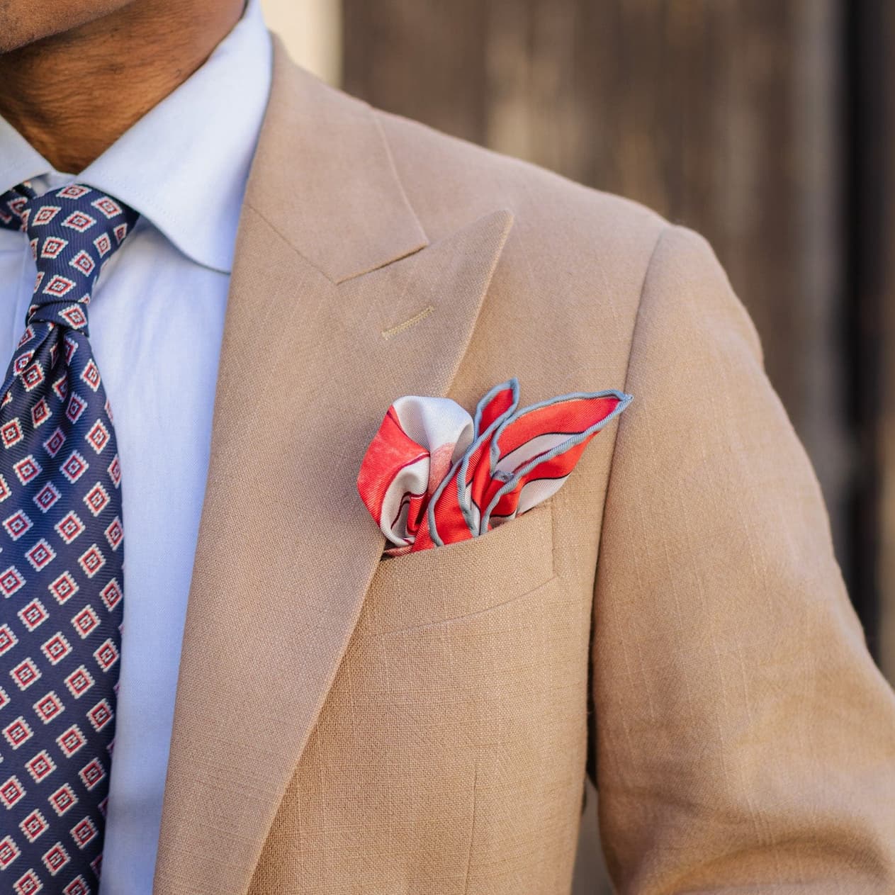 Medallion tie with red silk pocket square