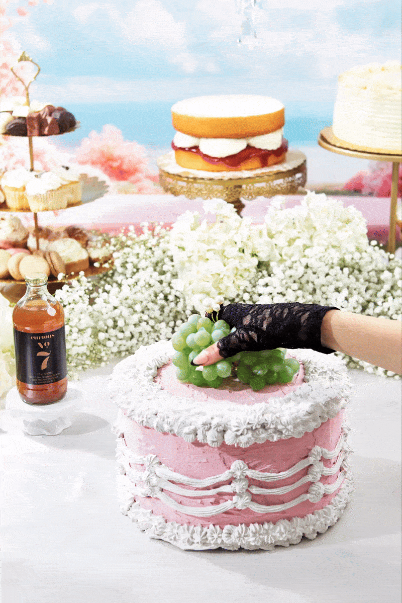Gif of Curious No. 7 with a wedding cake