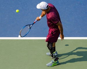 Player hitting backhand