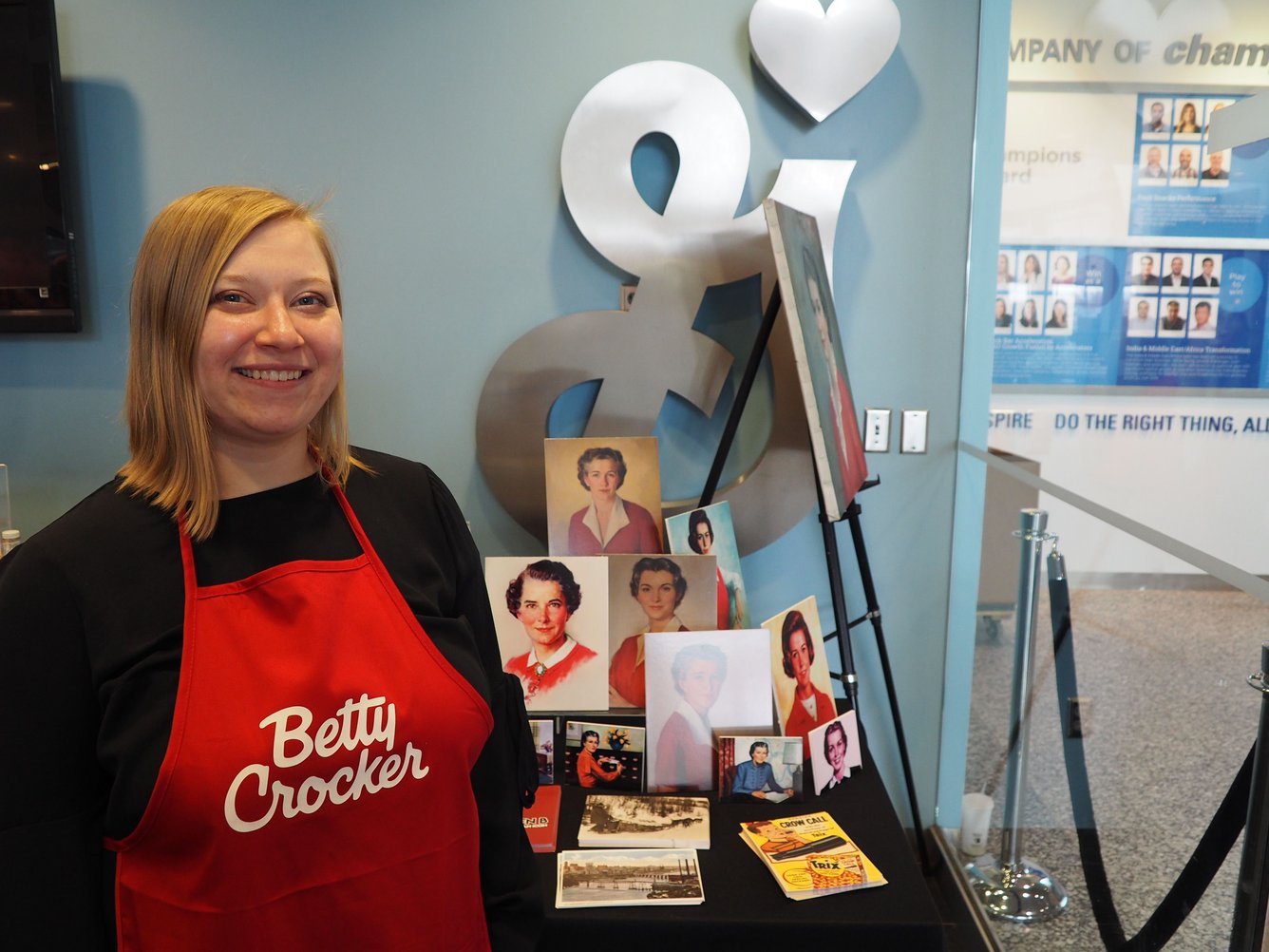 General Mills' corporate archivist Natasha Bruns pictured with Betty Crocker materials.