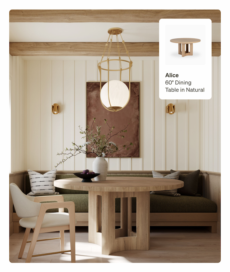 An Alice 60" dining table in Natural finish, placed in a cozy dining nook with a built-in bench and a gold chandelier.