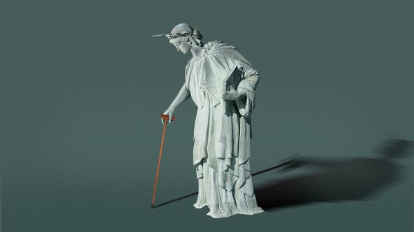 Stylized illustration of the Statue of Liberty leaning on a cane, with a long shadow against a muted gray background.