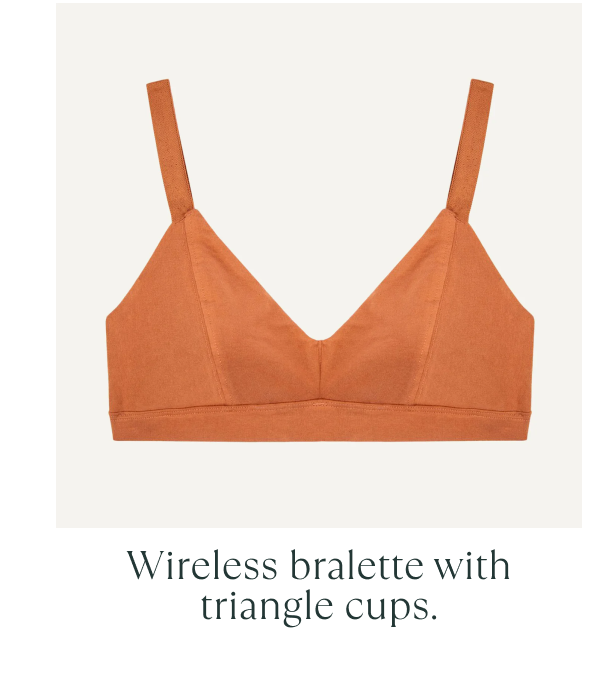 Rust-colored wireless bralette made from organic cotton, featuring triangle cups and adjustable straps.