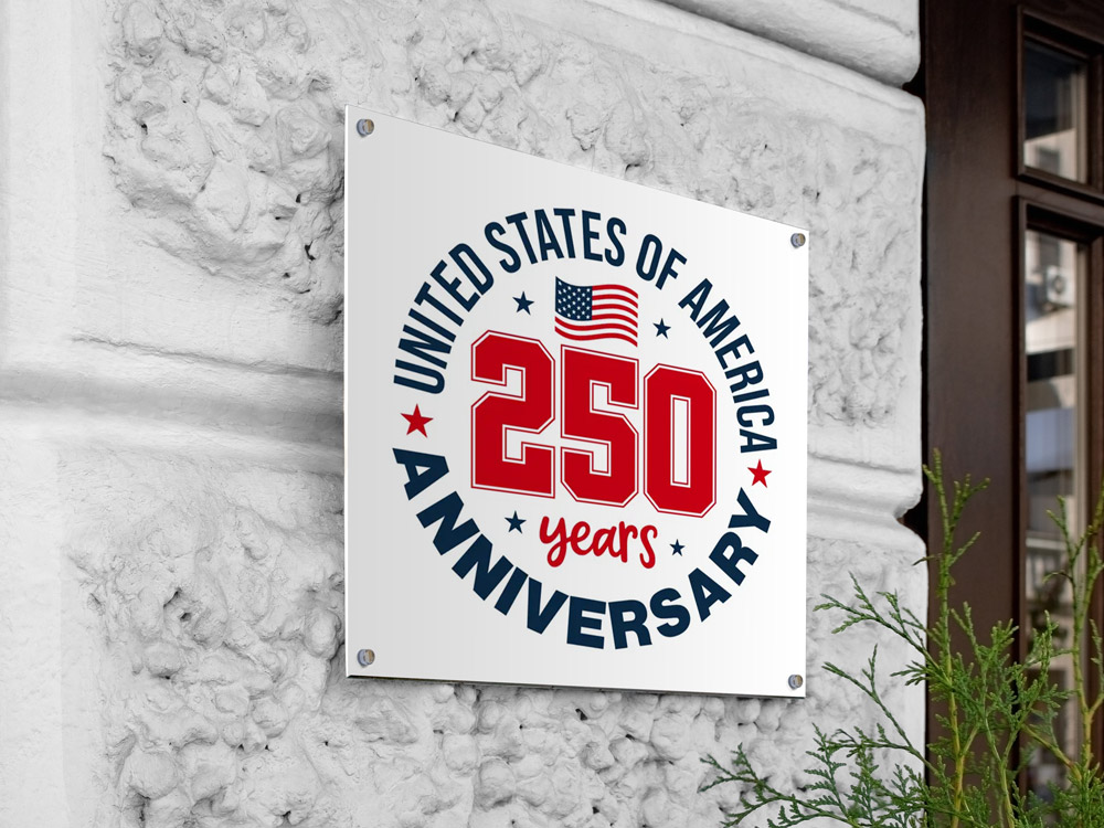 Custom aluminum business sign mounted to an exterior wall, featuring a patriotic red, white, and blue “United States of America 250 Years Anniversary” design with an American flag graphic. The durable metal sign commemorates the nation’s 250th anniversary and is ideal for storefronts, offices, and civic displays.
