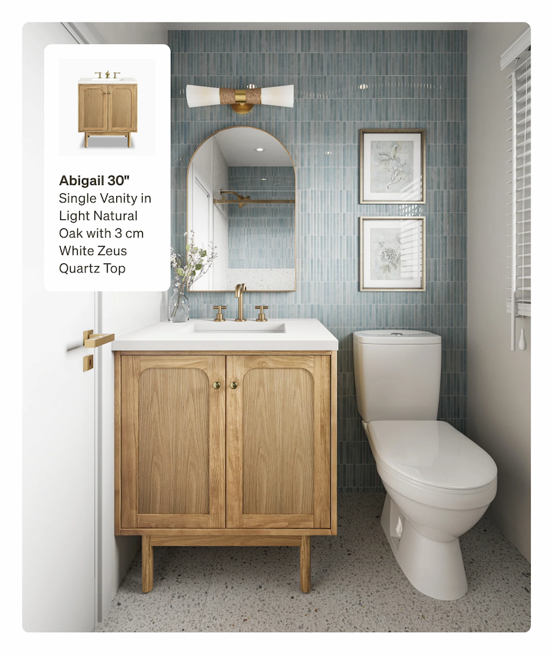A light wood bathroom vanity with a white top, a round gold-framed mirror, and blue subway tile 