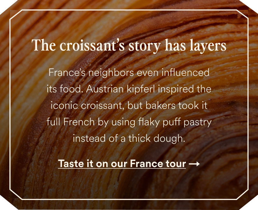 Golden croissant with The croissant’s story has layers headline and Taste it on our France tours link — opens France tours