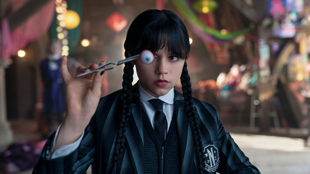 Jenny Ortega as Wednesday Addams, holding an eye in Wednesday 