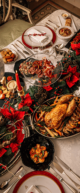 A table set with holiday dishes.