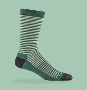 Shop Stripes - a green striped sock on a seafoam background