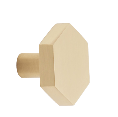 Brushed gold hexagon-shaped cabinet knob.