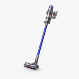 A Dyson V11 cordless vacuum cleaner on a gray tile.