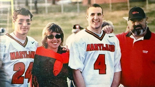 Four members of the Hochstadt family, two wearing Maryland jerseys