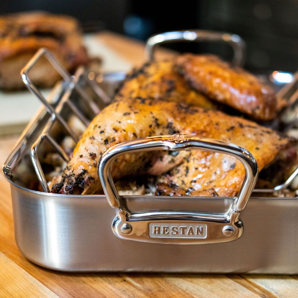 IMG: Roasted turkey in Hestan Roaster displayed in wooden table