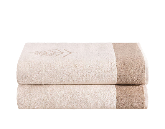 Two beige towels folded with a Four Seasons tree logo.