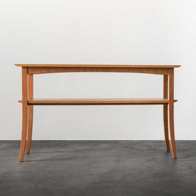 The wing hall table in cherry.