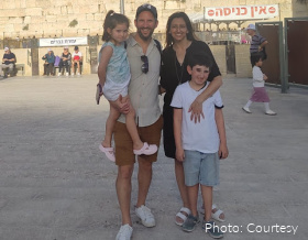 A man, woman, and their two children.