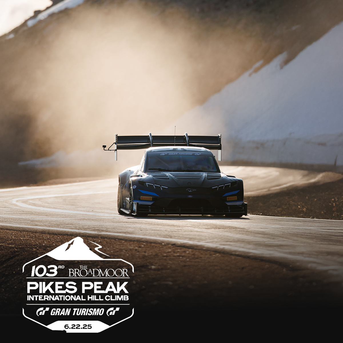 The Super Mustang Mach‑E&reg; race car on a track, with the Broadmoor Pikes Peak International Hill Climb logo below