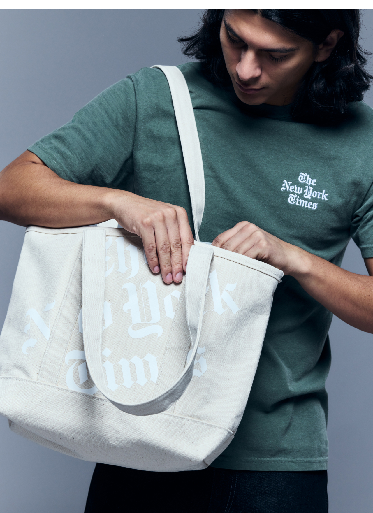 Model wearing Stacked Logo Embroidered Shirt and Stacked Logo Zip-Top Canvas Tote