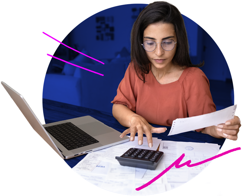 Woman doing her taxes at a laptop