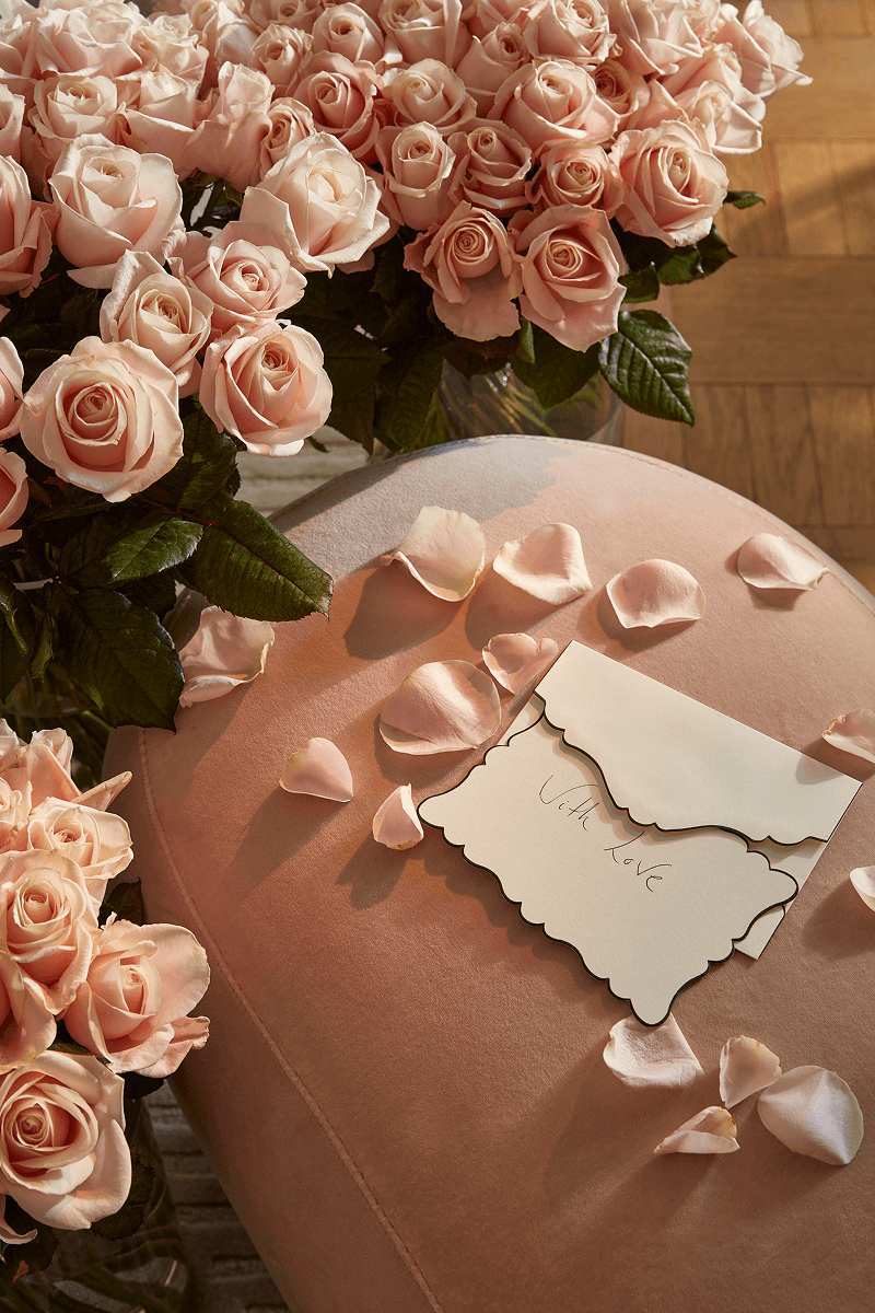 Bouquets of roses and a love letter