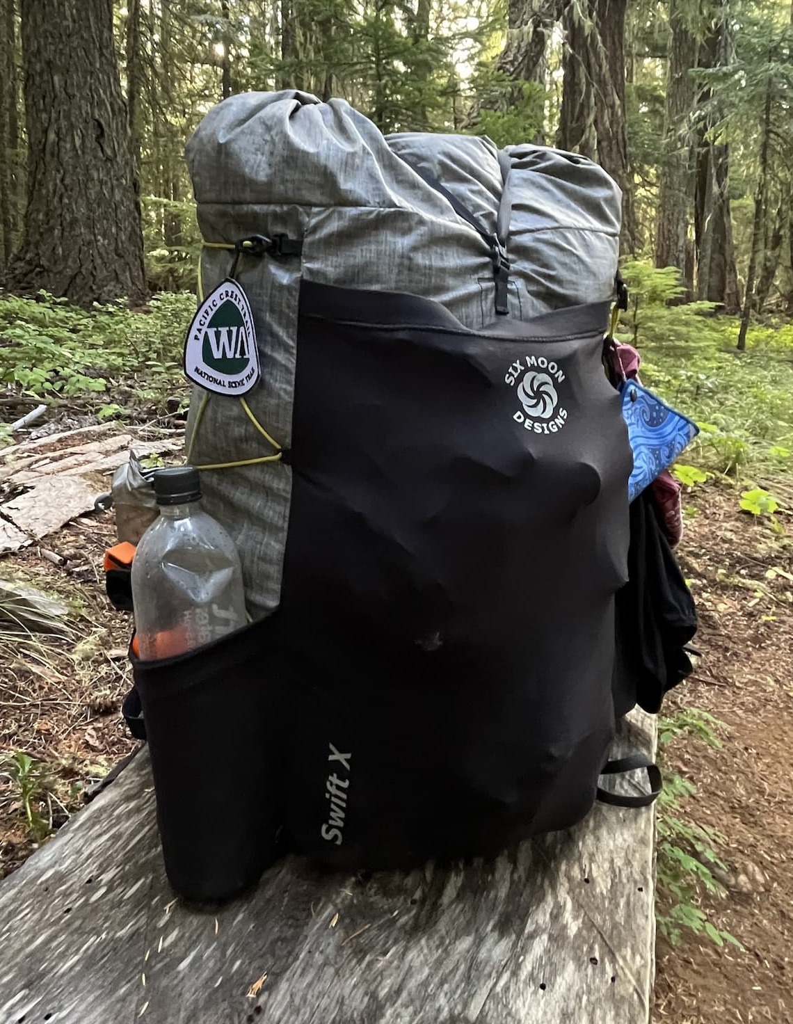 gif of girl wearing and setting up tent