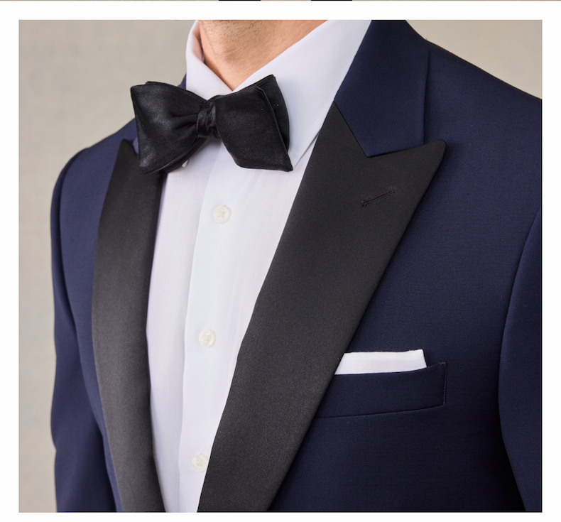 The essential navy tuxedo with silk peak lapels and a single button closure. Includes jacket with an option of slim or classic fit pants. Our new Essentials Collection delivers premium quality and an exceptional fit, all for $275.