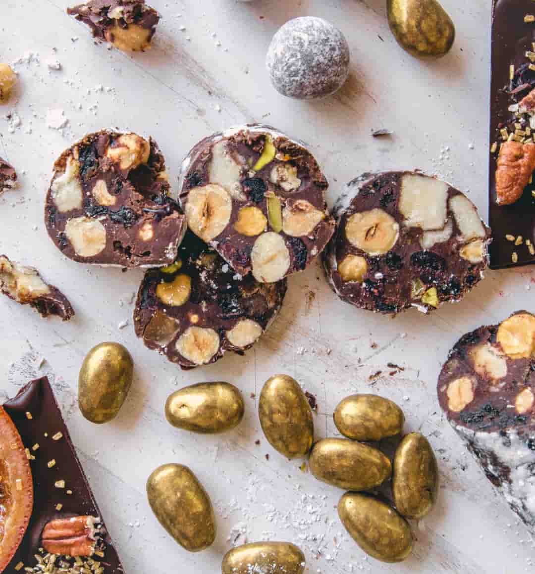 Slices of Chocolate Salami studded with toasted nuts, fruit, and puffed quinoa.