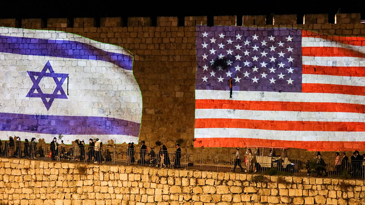 United States and Israel flags are projected on the walls of the Old city of Jerusalem