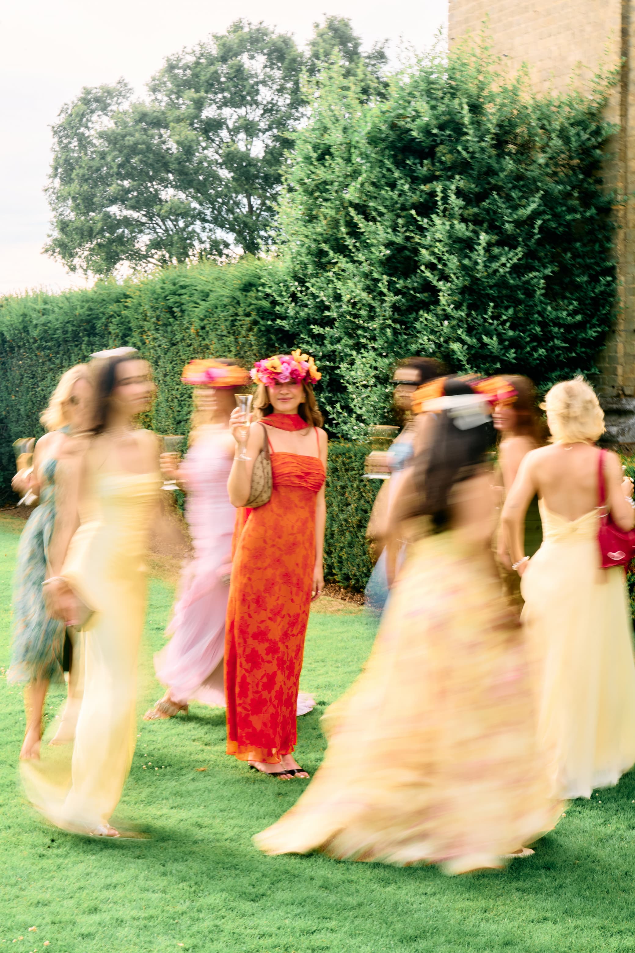 Azazie x The Wedding Edition summer event at Hedsor House with guests wearing elegant occasion dresses