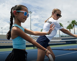 Coach with youth player&nbsp;