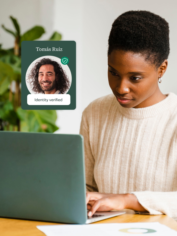 Photo-of-a-woman-on-laptop-in-office-space-with-real-talent-UI