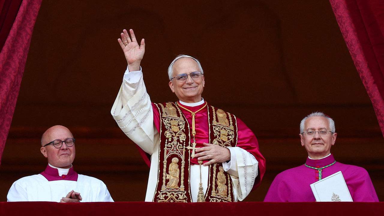 Newly elected Pope Leo XIV, Cardinal Robert Prevost of the United States appears on the balcony of St. Peter's Basilica, Vatican.