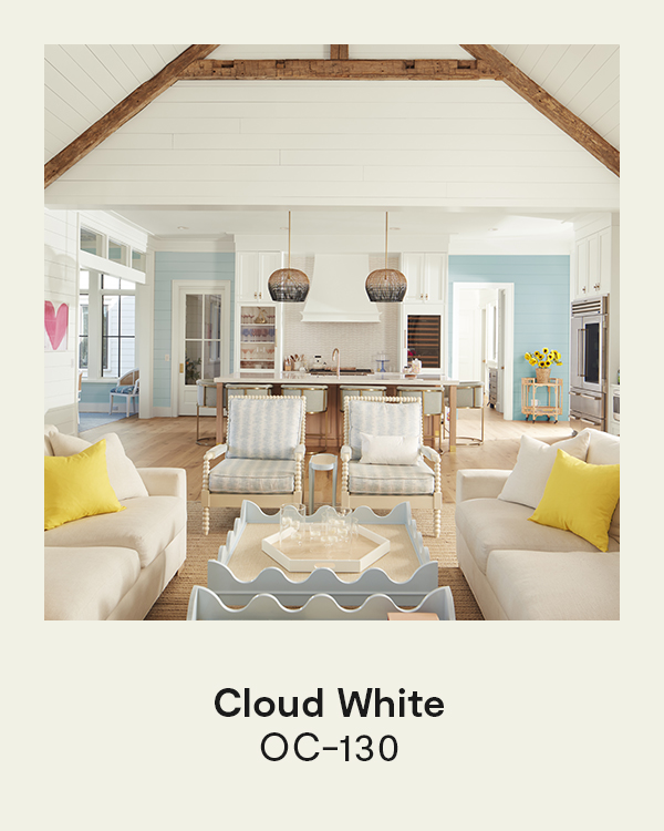 Cloud White OC-130 - A living room with white painted ceilings, a white trim and accent wall, and baby blue walls.