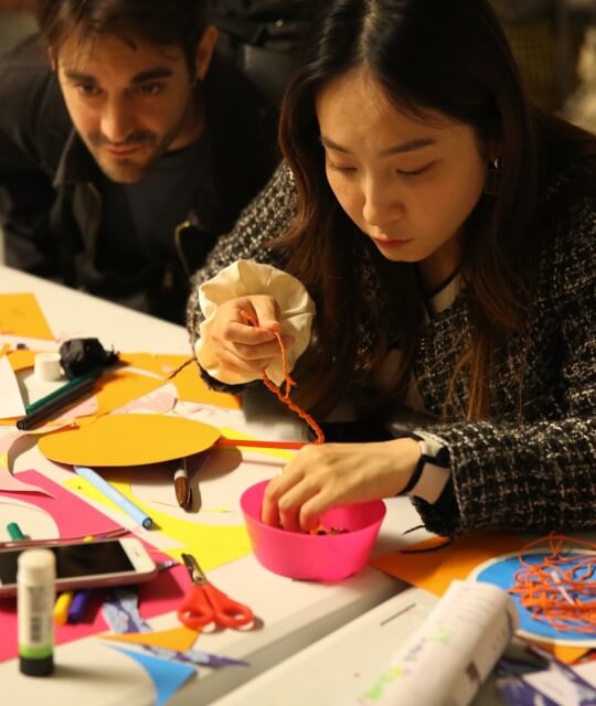 Visitors taking part in craft activities. 