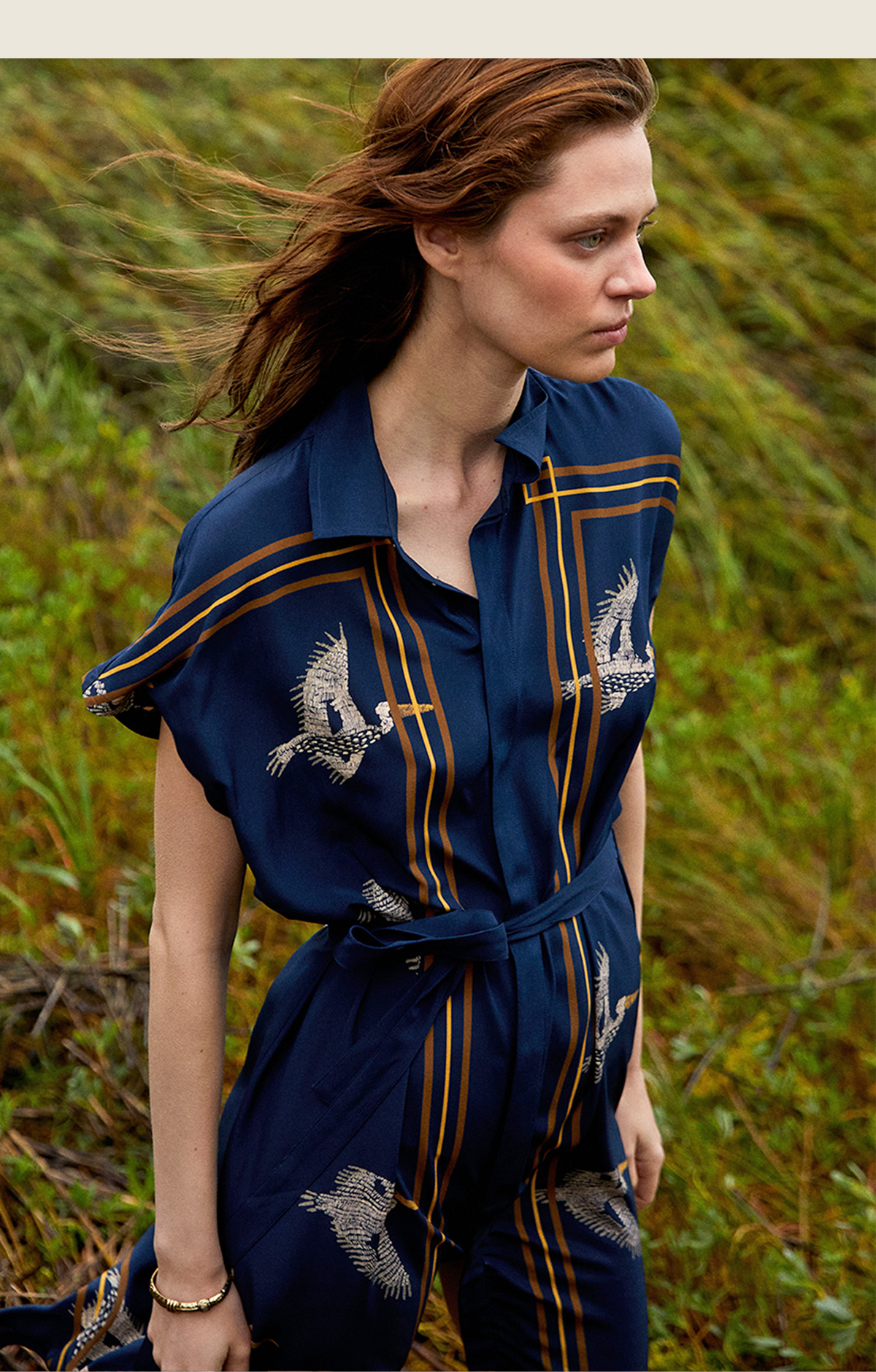 Model wears the Pelican Print Dress