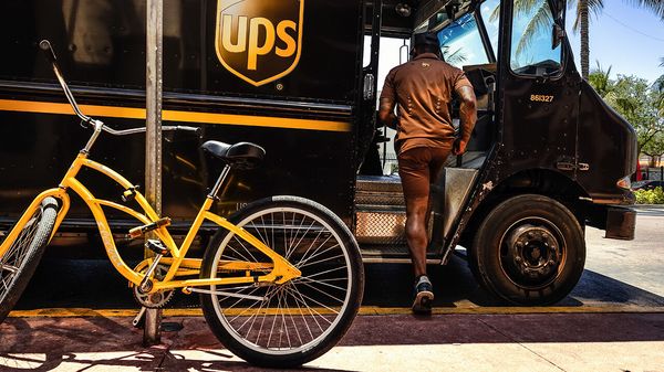 A UPS driver makes deliveries in Miami