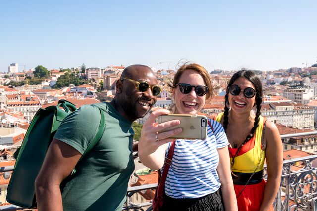 Snap a picture with new friends in Lisbon