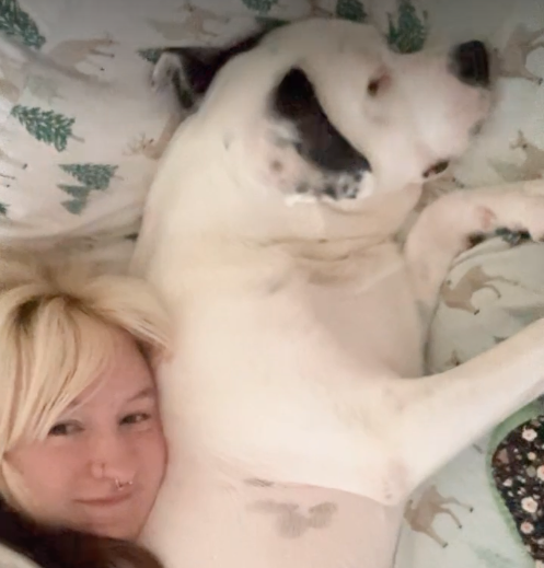 Dog Mr. Darcy and adopter