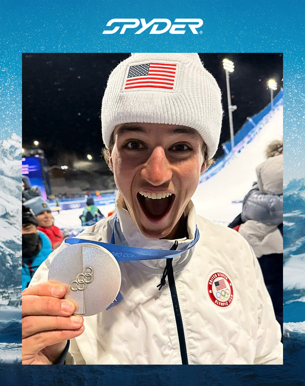 Photo of Mac Forehand holding up his Silver Medal win at the Olympics