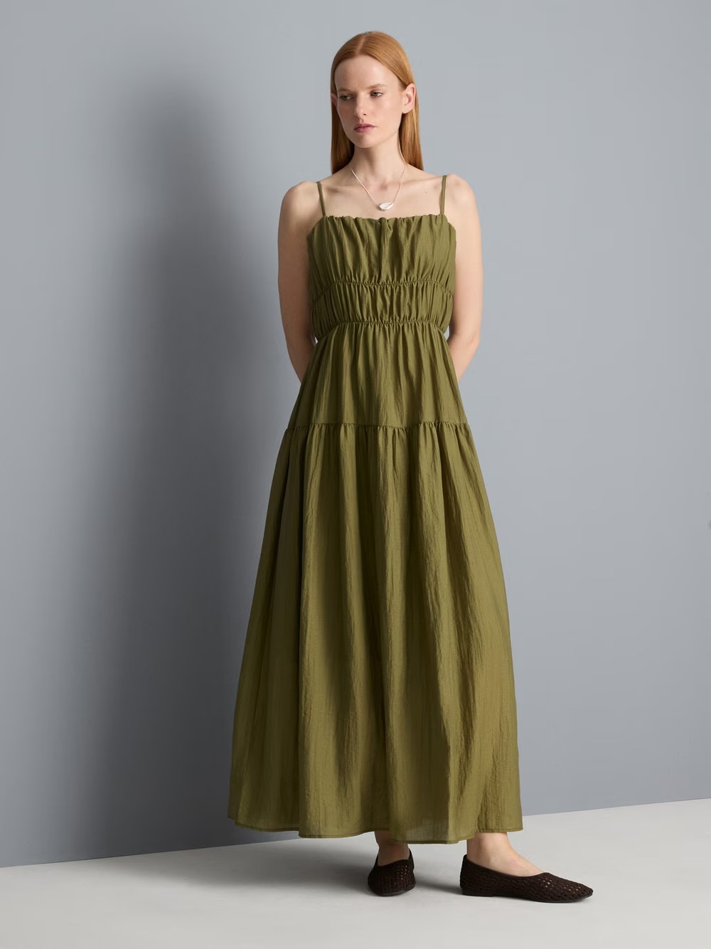 Woman wearing Tiered Smock Maxi Dress