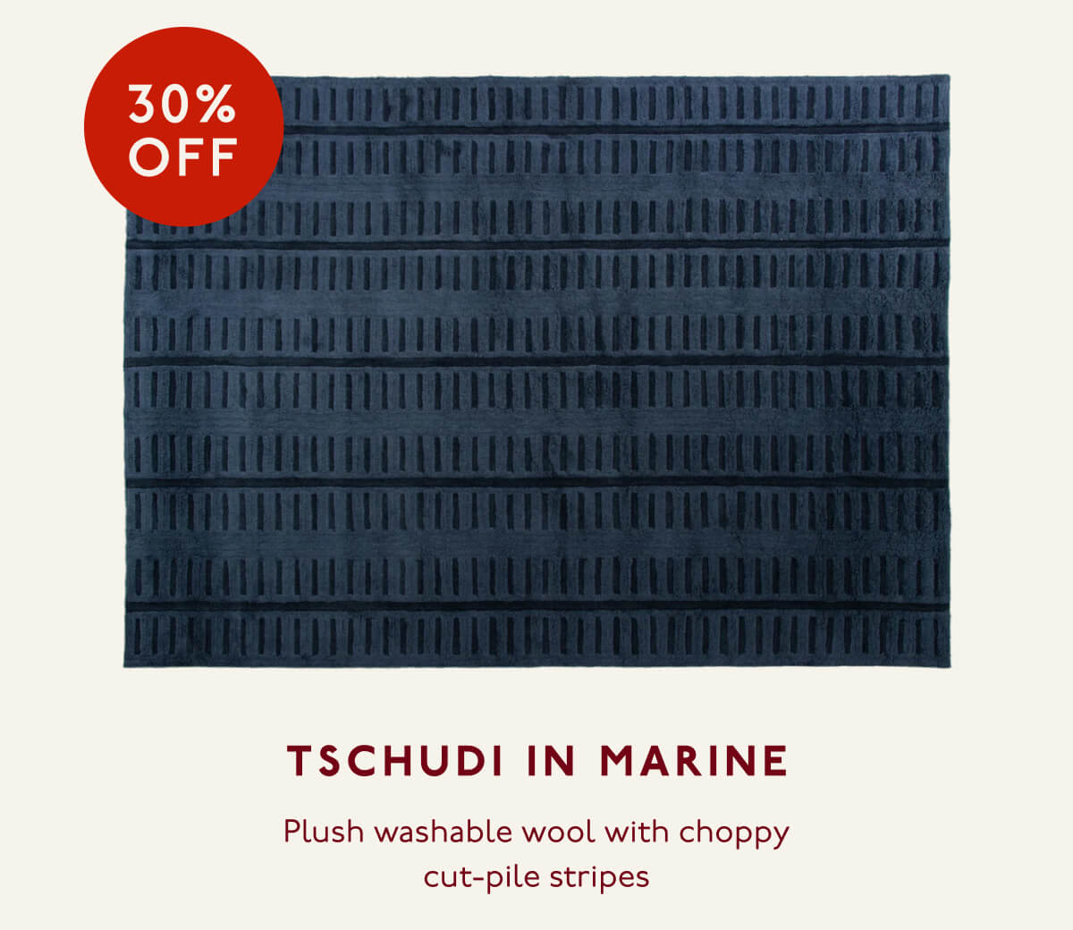 Tschudi in Marine | 30% OFF | Plush washable wool with choppy cut-pile stripes.