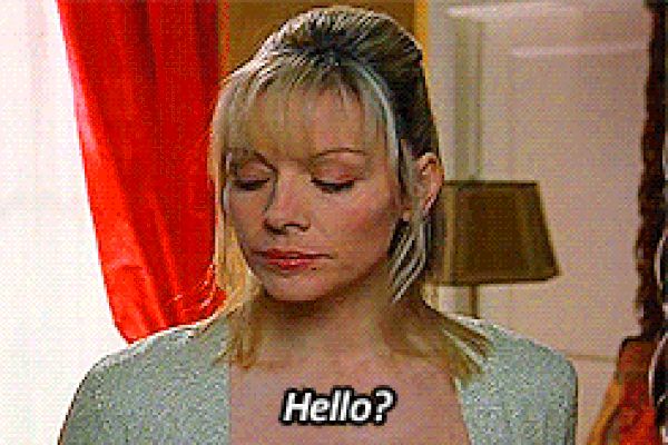 Samantha Jones from Sex and the City tilts her head and says, “Hello?” with a skeptical expression.