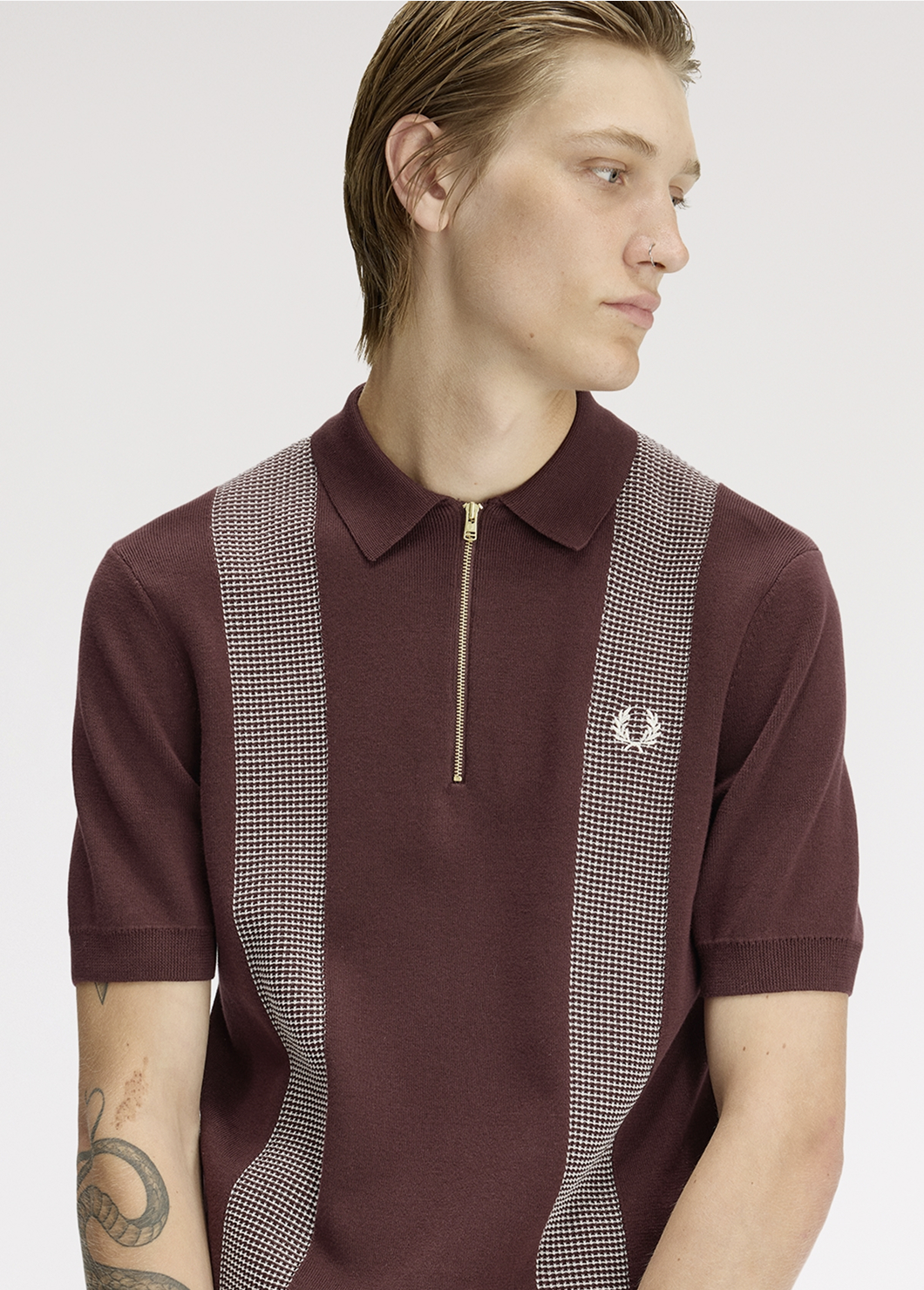 Male model wearing a Fred Perry Panel Detailed Knitted Shirt in Oxblood