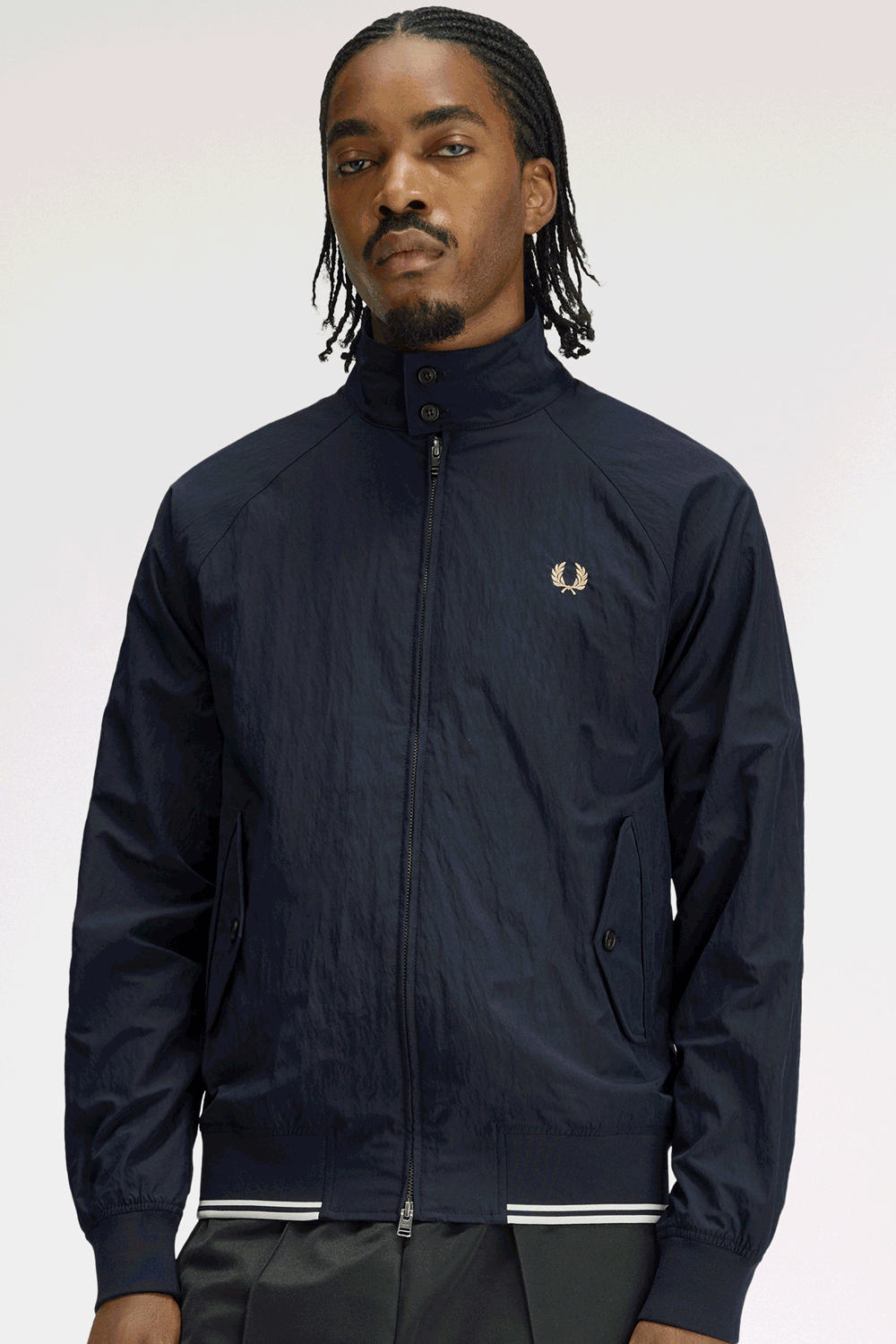 GIF of different shots on the crinkle Harrington Jacket in its different colourways; red, navy and ecru