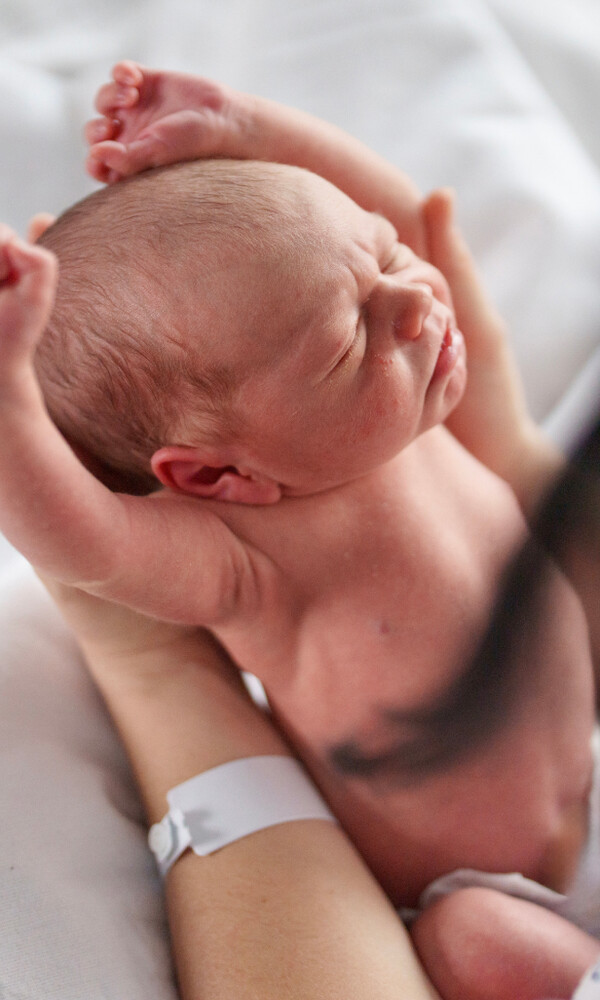 Image of newborn baby stretching